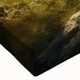 Close-up of a vibrant stretched canvas featuring a serene valley landscape design, showcasing intricate details in blues and greens, perfect for home decor.