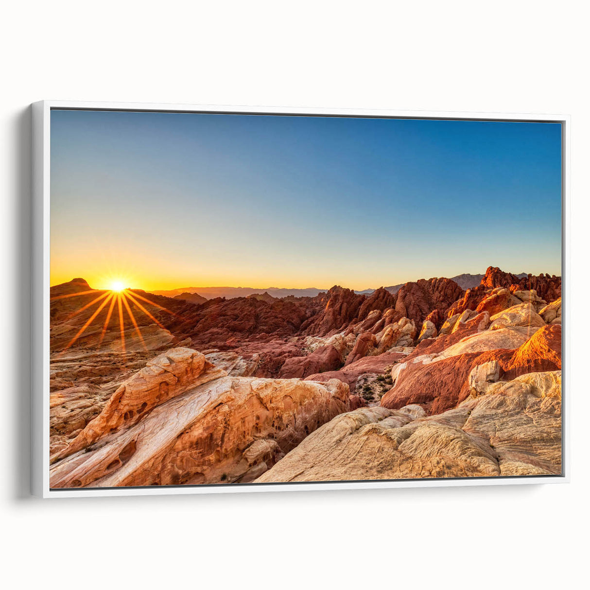 Framed canvas wall art of a serene valley landscape, showcasing vibrant greens and blues with a white frame, perfect for home decor accents.