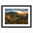 Framed wall art featuring a serene landscape design of a valley, displayed in a sleek black frame with a white mat, perfect for modern home decor.