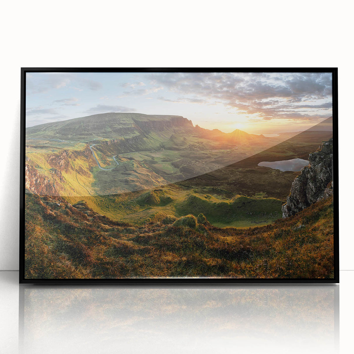 Framed acrylic wall art showcasing a serene valley landscape design with vibrant colors, set against a sleek black frame, perfect for modern home decor.