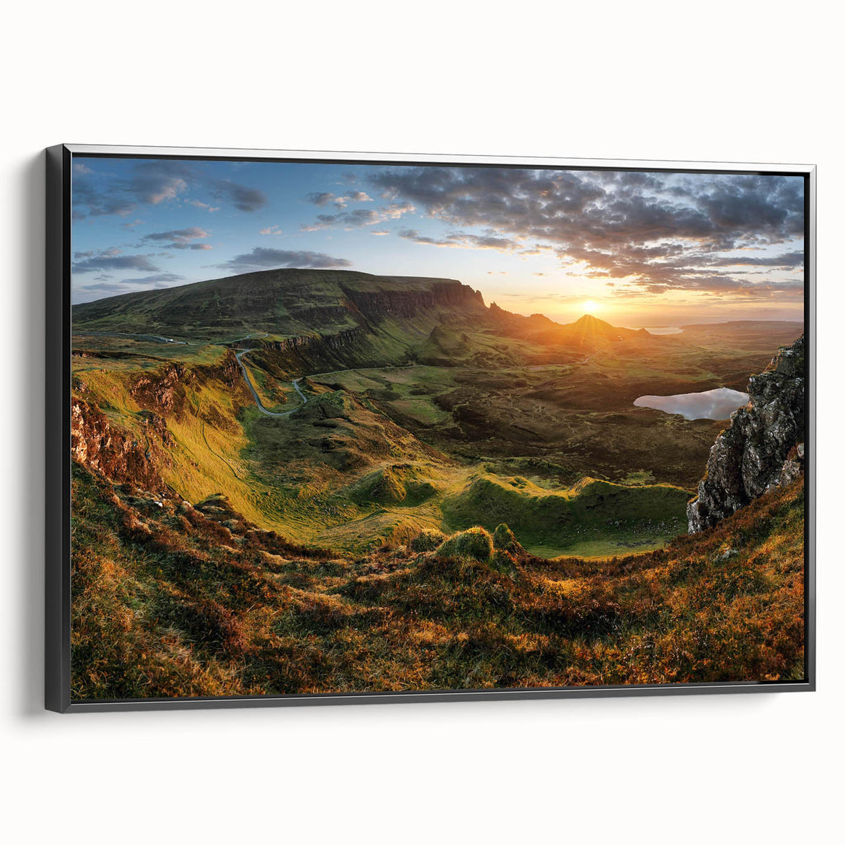 Framed canvas wall art showcasing a serene valley landscape design with black framing, adding elegance to home decor, viewed from the side.