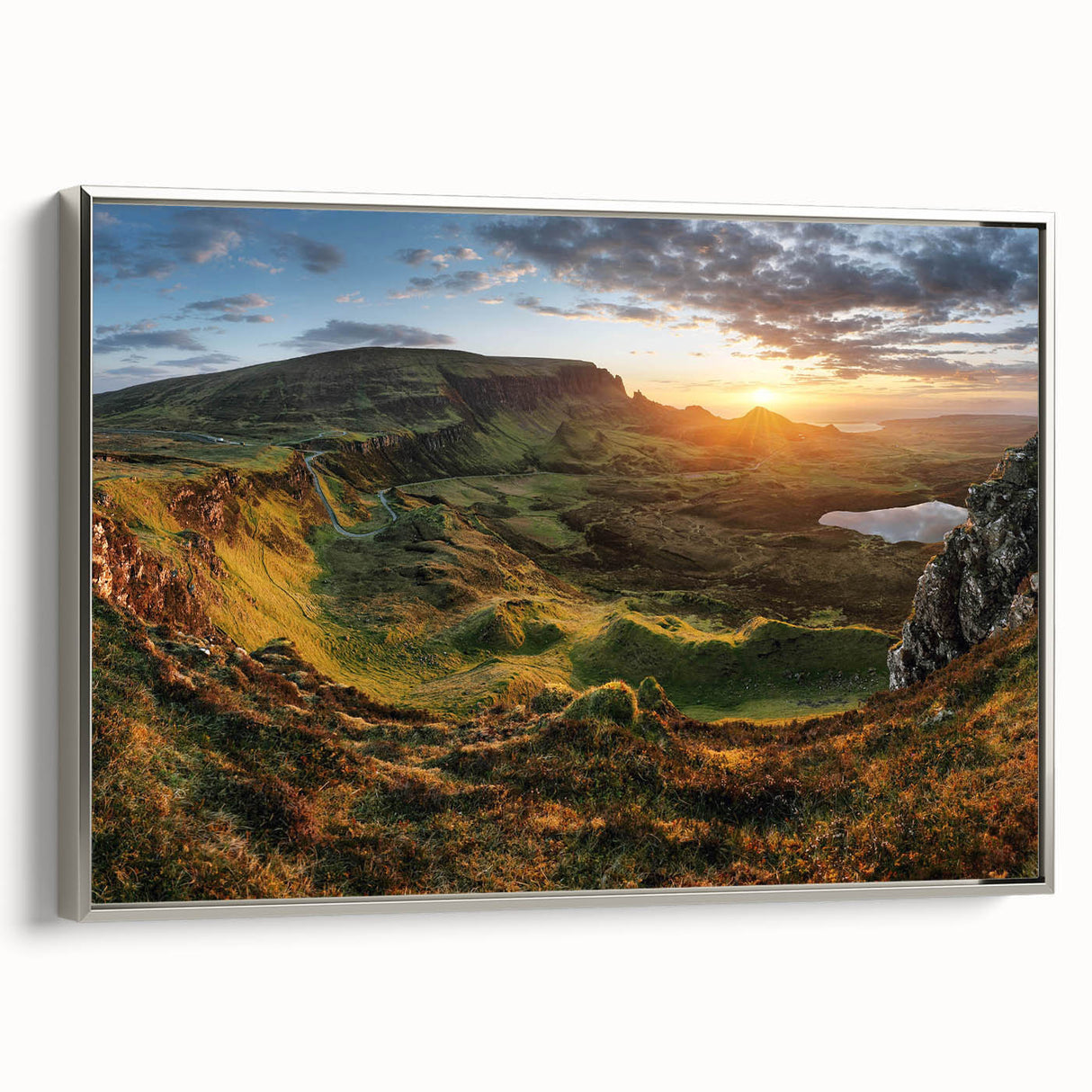 Framed canvas wall art showcasing a serene valley landscape with vibrant colors, silver frame, and a sleek side view, ideal for enhancing home decor.