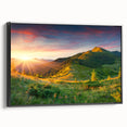 Framed canvas wall art showcasing a serene valley landscape design, featuring rich green hills and a clear blue sky, viewed from a black side angle, ideal for home decor.