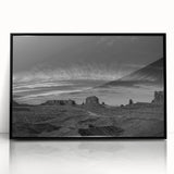 Framed acrylic wall art featuring a serene landscape of a valley with lush greenery and soft blue skies, designed to enhance modern home decor.
