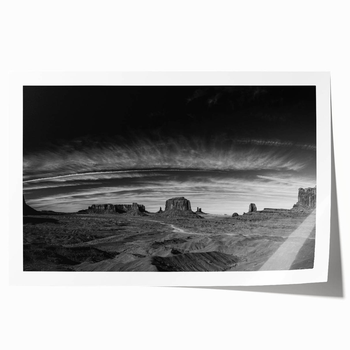 Stunning rolled print of a serene valley landscape, showcasing lush green hills and a clear blue sky, ideal for home decor or artistic display.