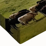 Close-up of a stretched canvas featuring a vibrant landscape valley design, showcasing rich colors and intricate details, ideal for home decor.