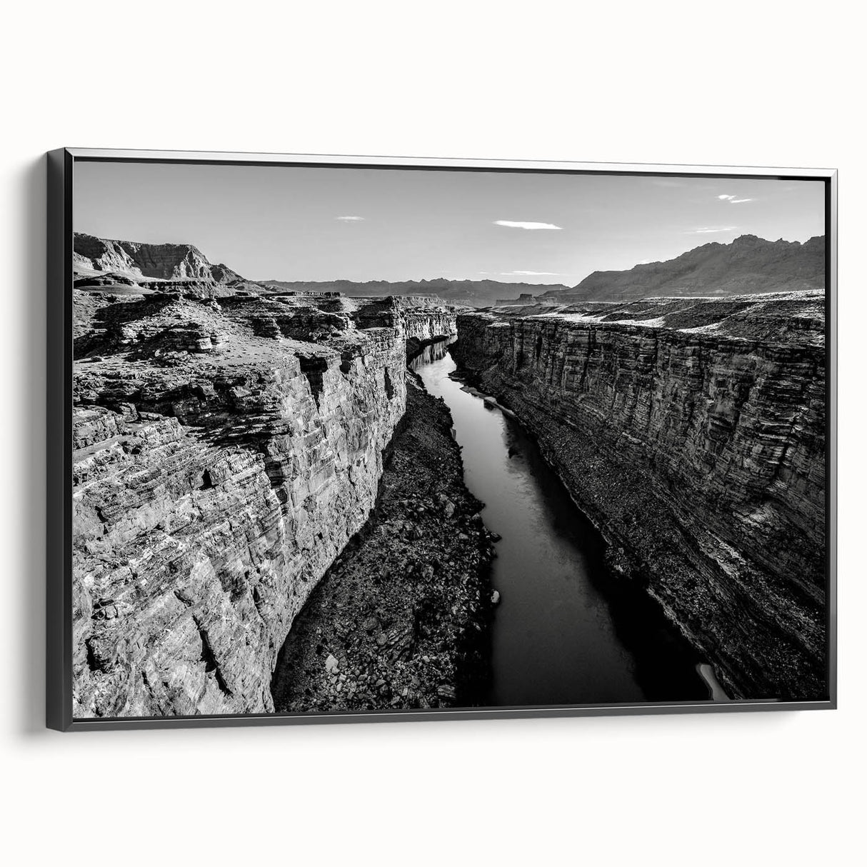Framed canvas wall art collection showcasing a serene valley landscape design in vibrant colors, with a sleek black frame and side profile view, perfect for home decor.