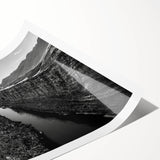 Serene landscape wall art print showcasing a vibrant valley scene with lush green hills and a clear blue sky, rolled for easy transport and display.