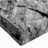 Stretched canvas close-up showcasing a colorful abstract landscape design with vibrant hues of blue, green, and orange, ideal for modern home decor.