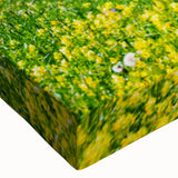 Close-up of a stretched canvas wall art piece showcasing a vibrant valley landscape design, featuring lush greenery and a serene atmosphere, perfect for home decor.