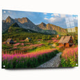 Acrylic glass wall art collection showcasing a vibrant landscape design featuring a serene valley view, displayed from a side angle with decorative pins for hanging.