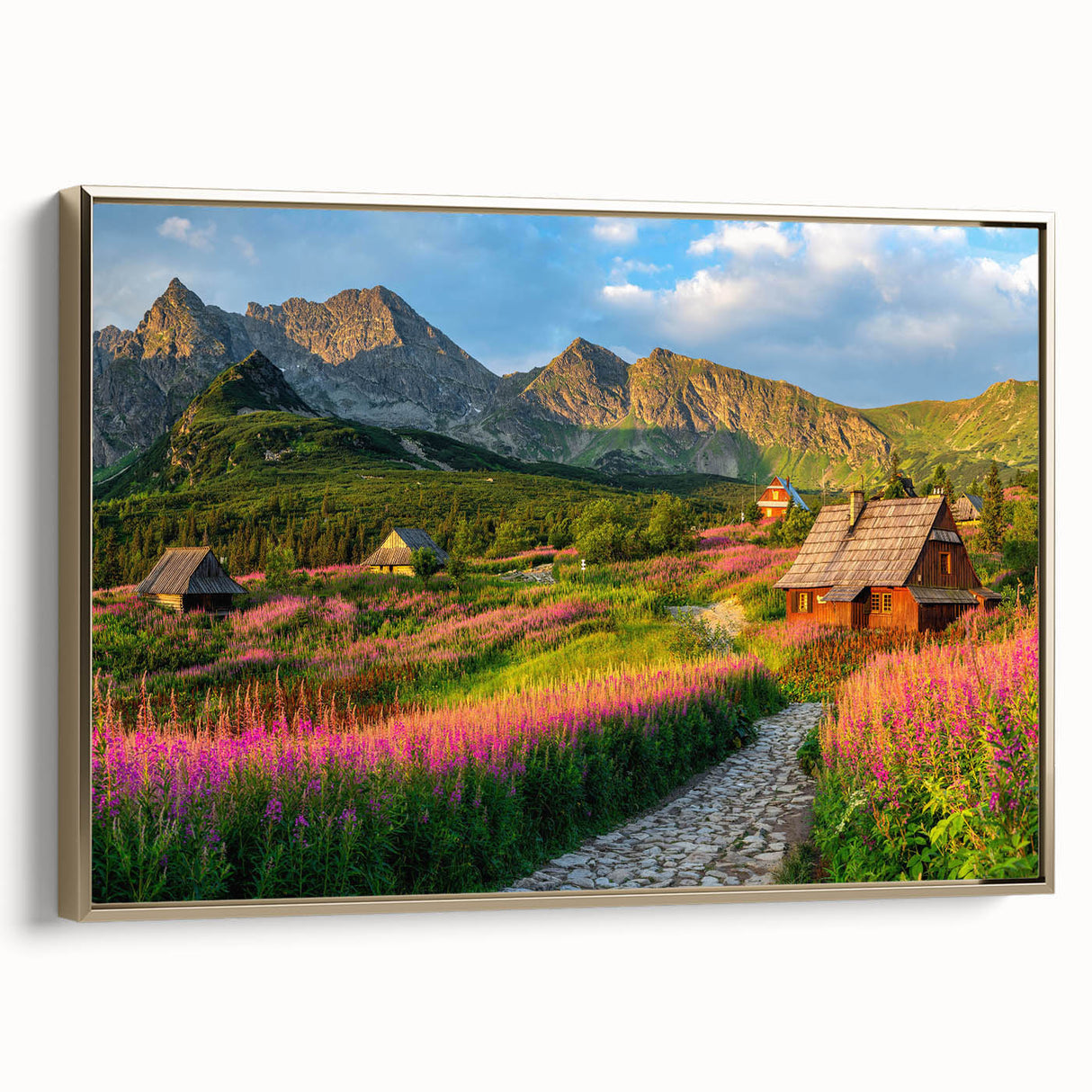 Framed canvas artwork showcasing a serene valley landscape with vibrant green hills and a golden sunset, ideal for home decor and wall art collections.