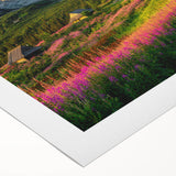 Rolled canvas wall art showcasing a serene valley landscape with vibrant greens and blues, designed for home decor, presented in a protective cardboard tube.