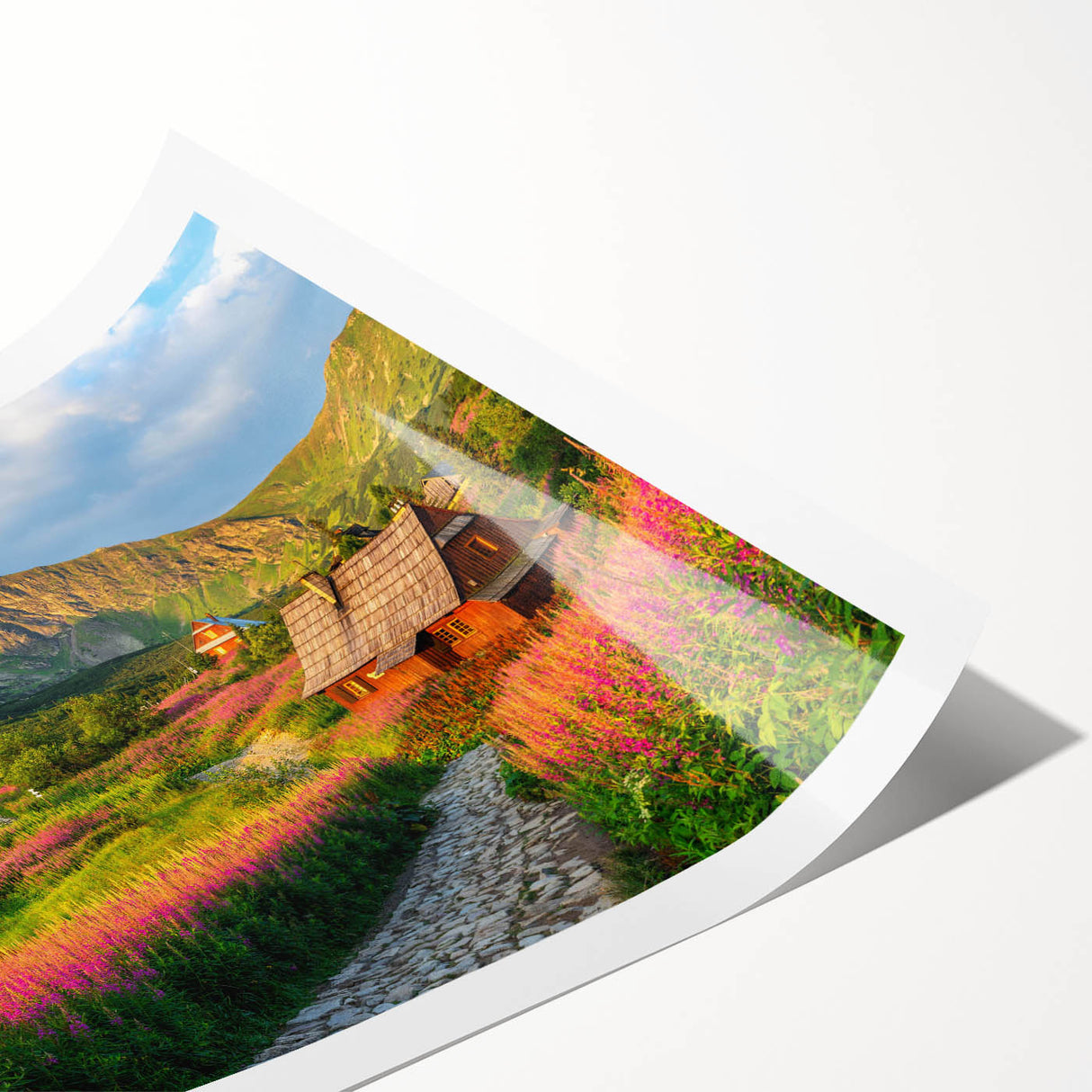 Serene landscape wall art print showcasing a vibrant valley scene with rolling hills and a colorful sunset, rolled for easy transport and display. Perfect for home decor.