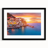 Framed wall art collection showcasing a picturesque village landscape design with a black mat and frame, perfect for enhancing home decor.