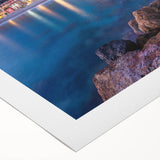 Rolled canvas displaying a vibrant landscape village design with rich colors and intricate details, ideal for home decor and art enthusiasts, packaged securely for delivery.