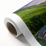 Rolled canvas art showcasing a vibrant landscape village design with rich colors and intricate details, ideal for home decor and artistic display, packaged securely.