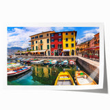 Colorful landscape wall art print depicting a serene village scene with rolling hills, vibrant trees, and a clear blue sky, ideal for home decor.