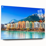 Acrylic glass wall art collection showcasing a vibrant village landscape design, featuring intricate details and rich colors, mounted with pins for a contemporary display.