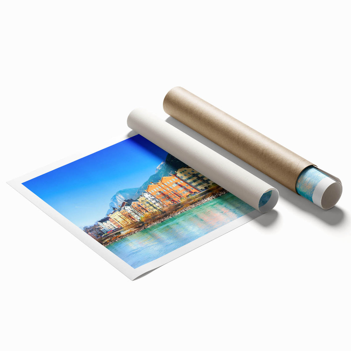 Rolled print showcasing a vibrant landscape village design in rich colors, ideal for home decor, packaged securely in a protective cardboard tube for easy display.