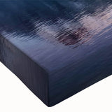 Close-up of a stretched canvas wall art piece showcasing a vibrant landscape village design, with rich colors and intricate details, perfect for enhancing home decor.