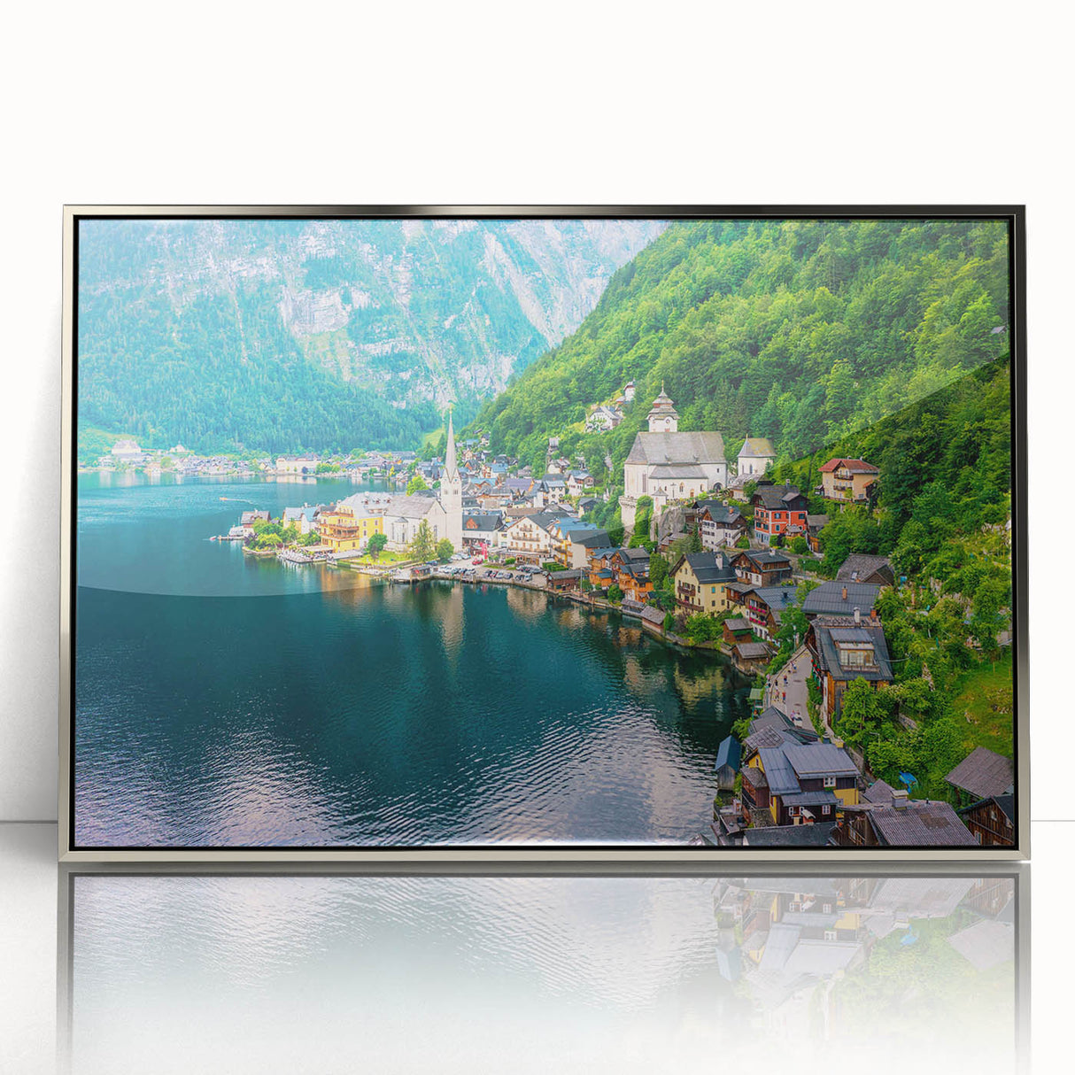 Framed acrylic wall art showcasing a serene village landscape with vibrant colors and intricate details, perfect for enhancing home decor aesthetics.
