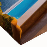 Close-up of a stretched canvas wall art featuring a vibrant village landscape design, showcasing intricate details and rich colors, perfect for home decor.