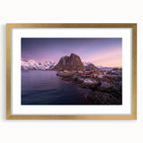 Framed wall art featuring a serene landscape village design in soft pastel colors, set in a gold frame with a mat, perfect for home decor enhancement.