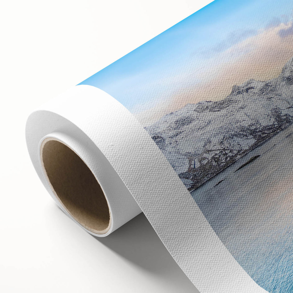 Rolled canvas showcasing a vibrant landscape village design, perfect for home decor, featuring rich colors and intricate details, packaged securely in a cardboard tube.
