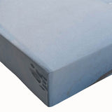 Close-up of a vibrant stretched canvas artwork showcasing a serene village landscape, featuring rich colors and intricate details, ideal for home decor and wall art enthusiasts.