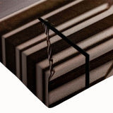 Close-up of a stretched canvas wall art piece showcasing a vibrant village landscape design, featuring rich colors and intricate details, perfect for home decor.