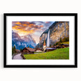Framed wall art collection showcasing a serene landscape and village design, featuring a sleek black frame and white mat, ideal for home decor enhancement.