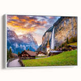 Framed canvas wall art showcasing a serene landscape of a quaint village, featuring warm earth tones and intricate details, ideal for home decor in modern settings.