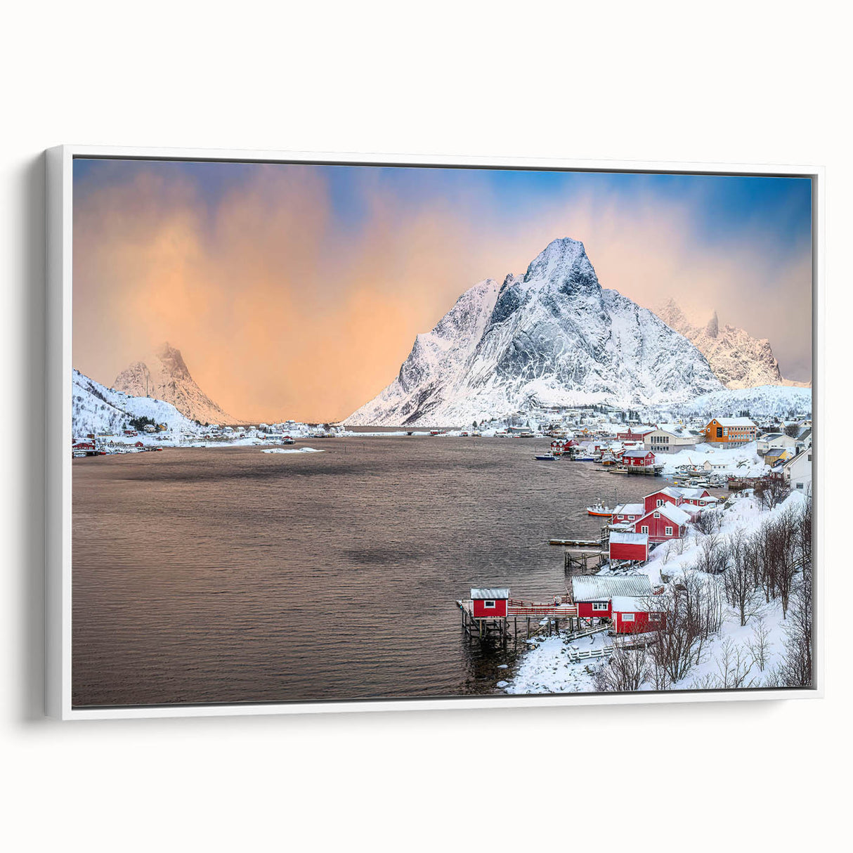 Framed canvas wall art showcasing a serene village landscape with vibrant colors, set against a white background, ideal for home decor and stylish interiors.