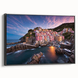 Framed canvas wall art showcasing a vibrant landscape of a charming village, featuring rich colors and intricate details, ideal for enhancing home decor.