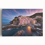 Vibrant stretched canvas wall art showcasing a picturesque village landscape with lush greenery and a clear blue sky, perfect for home decor.