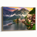Framed canvas artwork showcasing a picturesque village landscape design with golden accents, set against a light background, perfect for home decor.