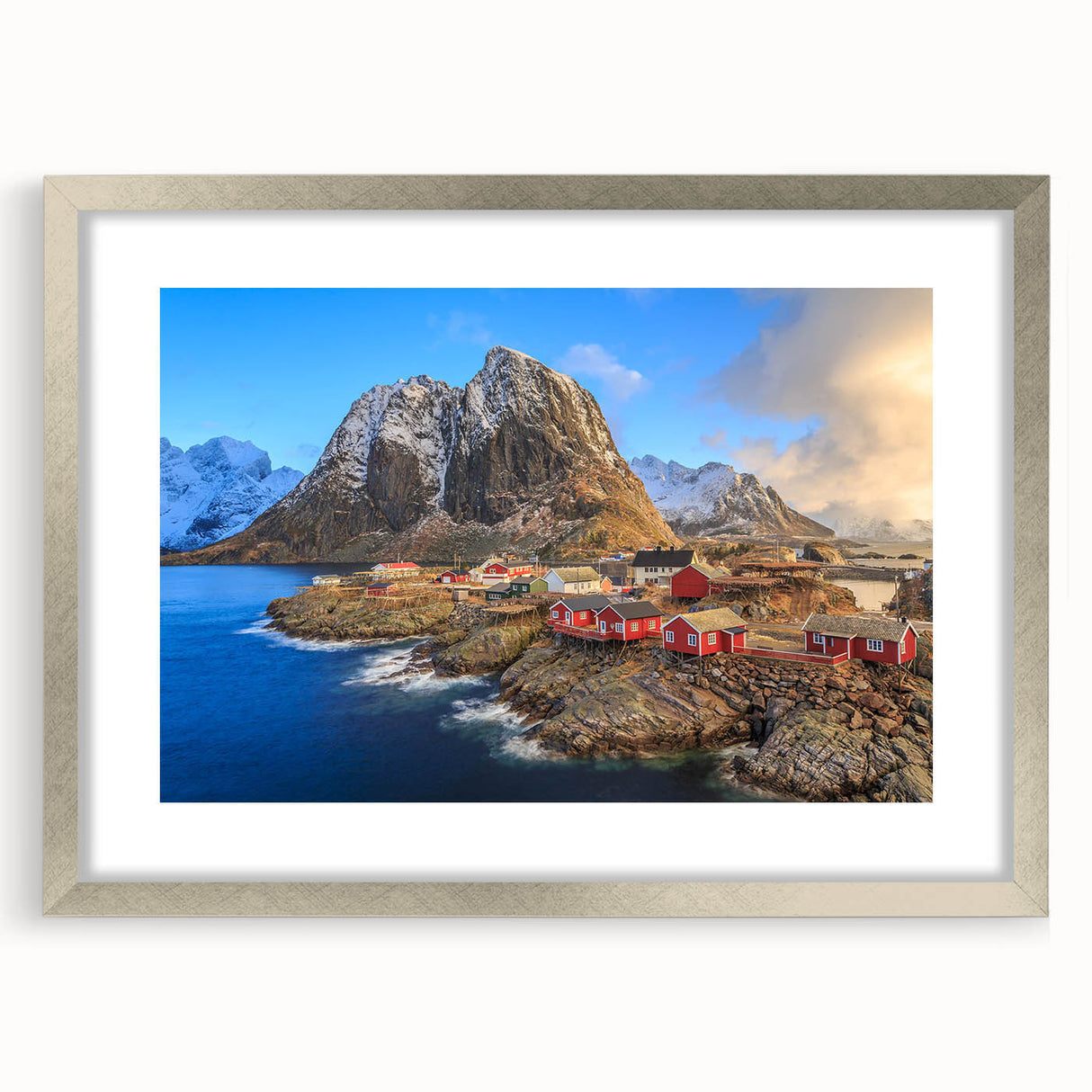 Framed wall art design showcasing a serene village landscape in soft pastel colors, featuring a silver mat and elegant frame, ideal for home decor.