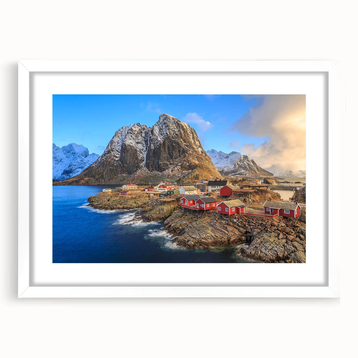 Framed wall art piece showcasing a serene village landscape design with a white mat, perfect for home decor, adding elegance and tranquility to any room.