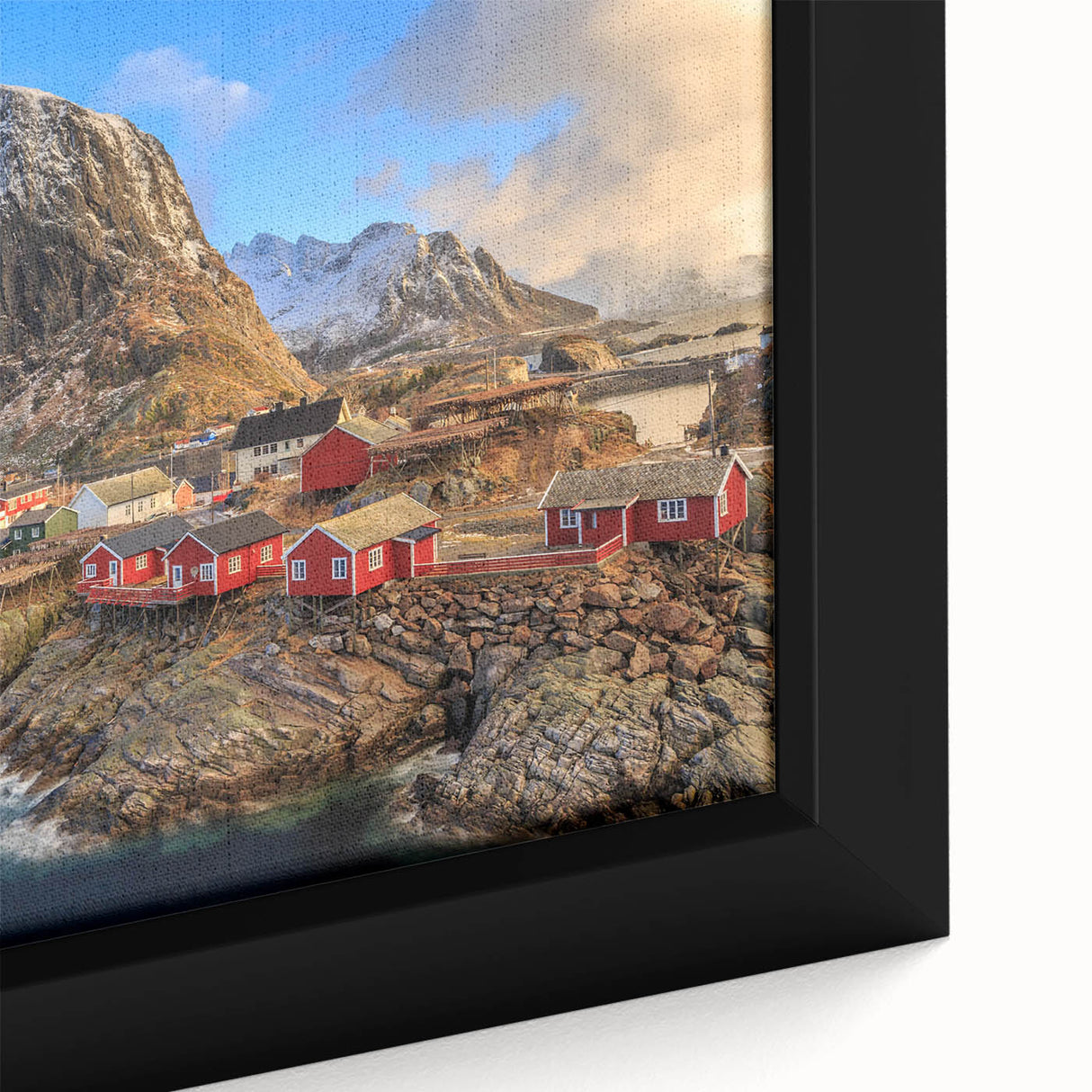 Framed canvas wall art showcasing a vibrant landscape of a tranquil village, featuring lush greenery and colorful houses, perfect for home decor enthusiasts.