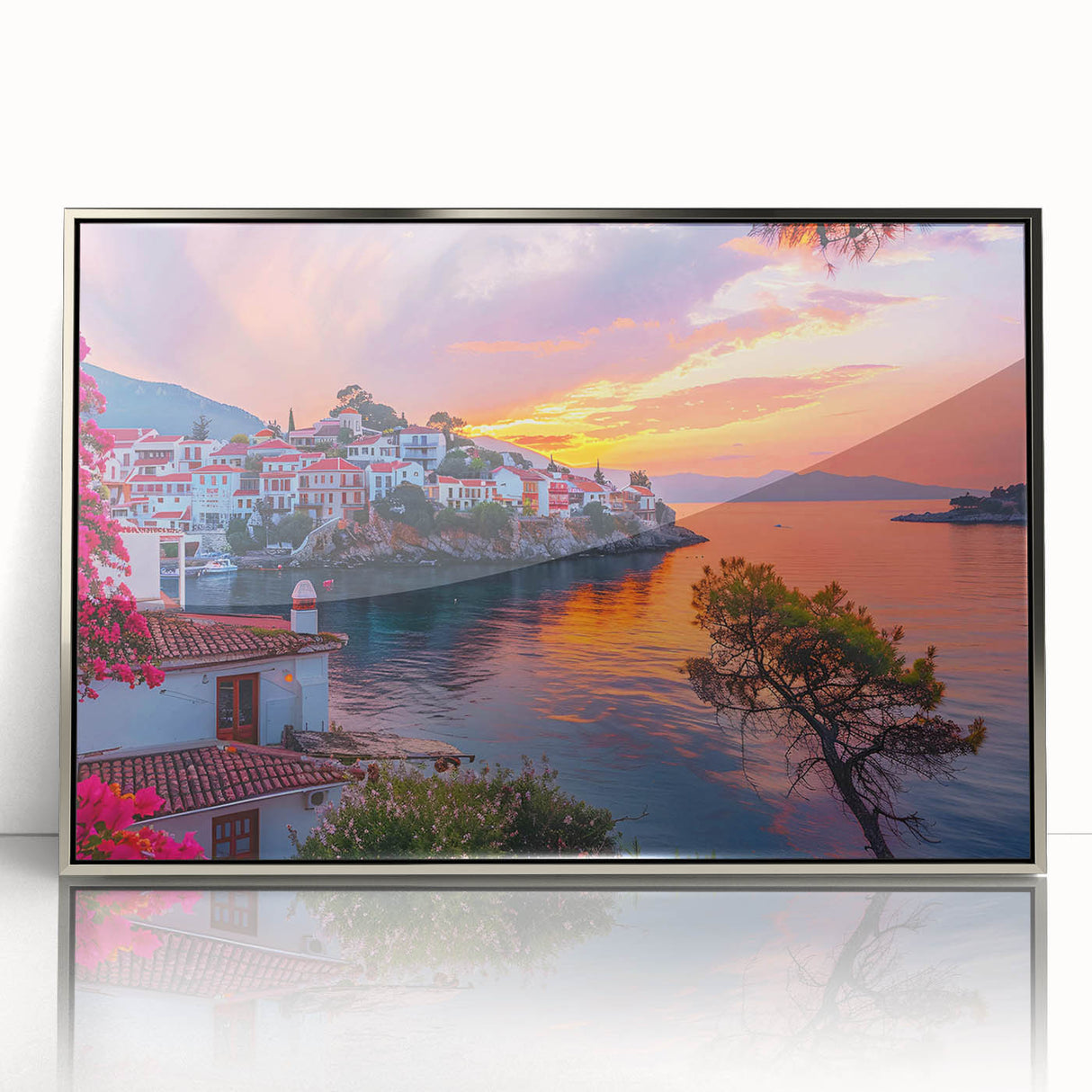Framed wall art featuring a serene village landscape design with vibrant colors and intricate details, presented in a sleek silver frame, perfect for home decor.