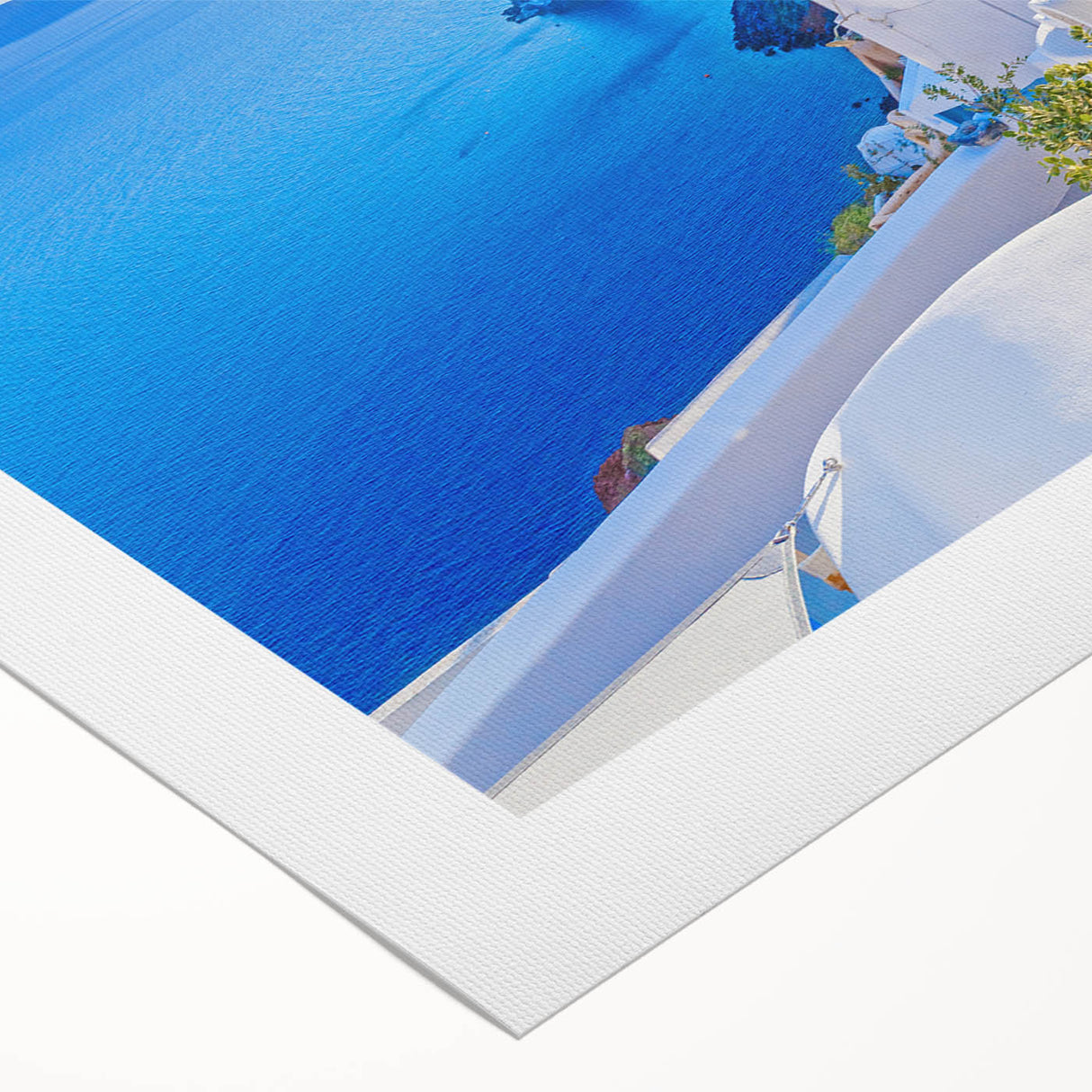 Rolled canvas artwork showcasing a vibrant landscape village design with rich colors, ideal for home decor. Packaged securely in a sturdy cardboard tube for protection.