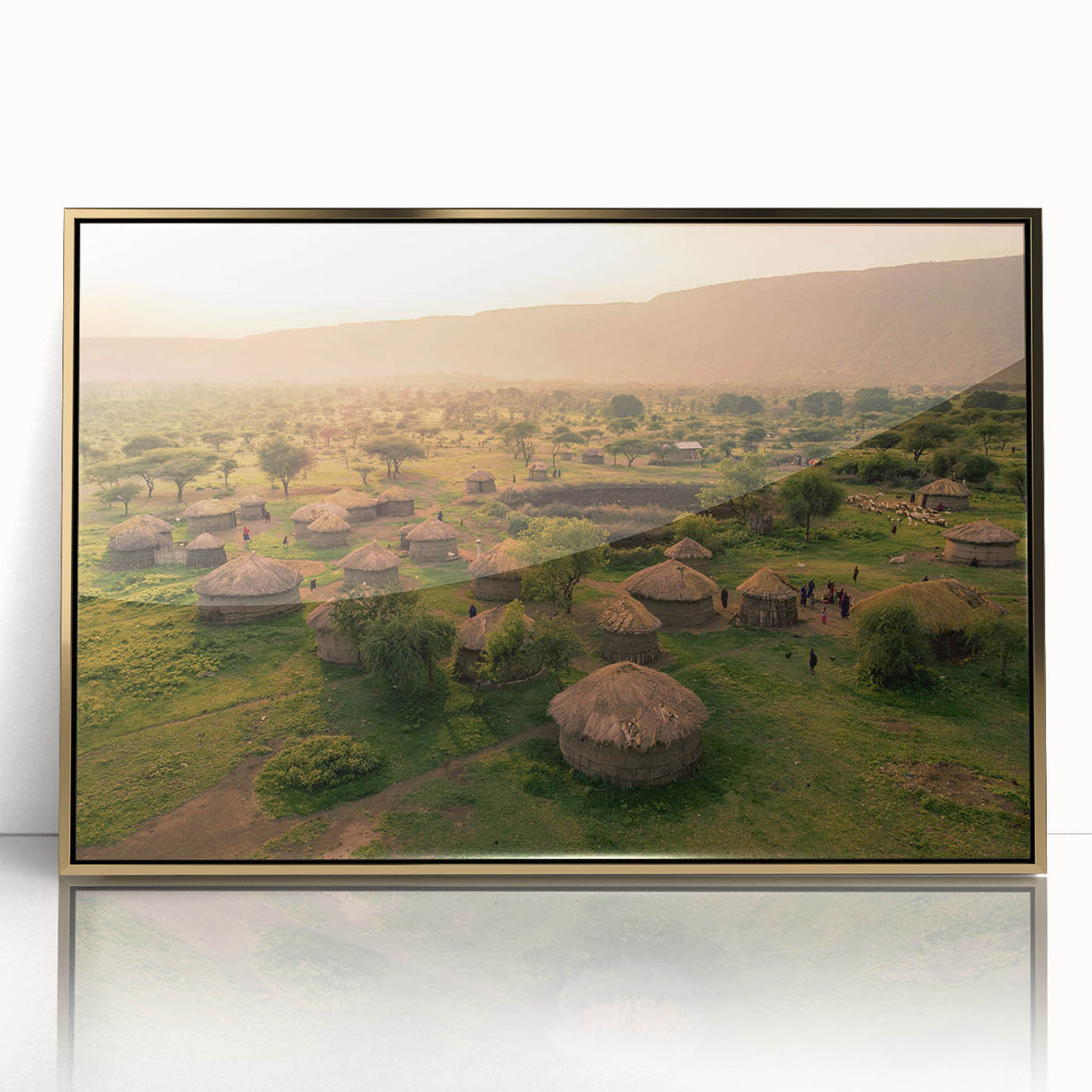 Framed acrylic wall art showcasing a serene landscape village design, featuring golden accents and a contemporary style, perfect for home decor enhancement.