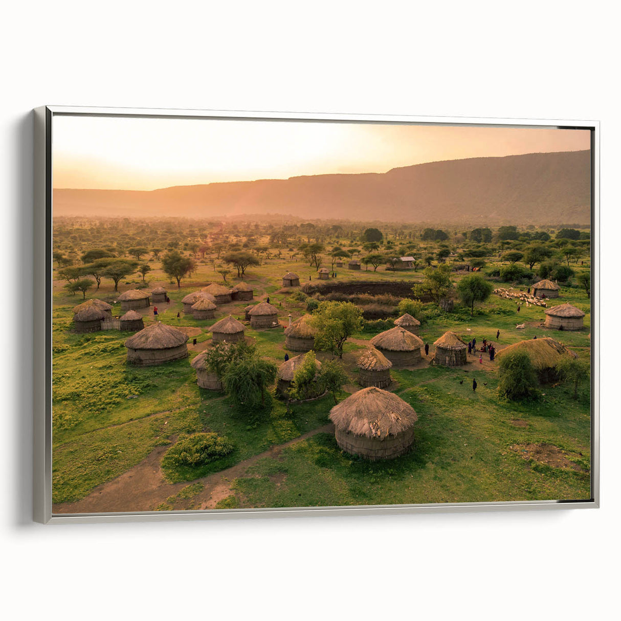 Framed canvas wall art showcasing a serene village landscape design with silver accents, enhancing home decor with a contemporary touch. Ideal for art enthusiasts.