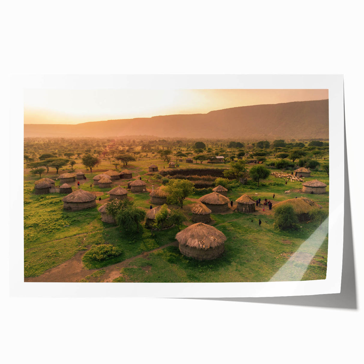 Rolled print showcasing a serene landscape with quaint village scenes, featuring soft pastel colors and intricate details, perfect for home decor enhancement.