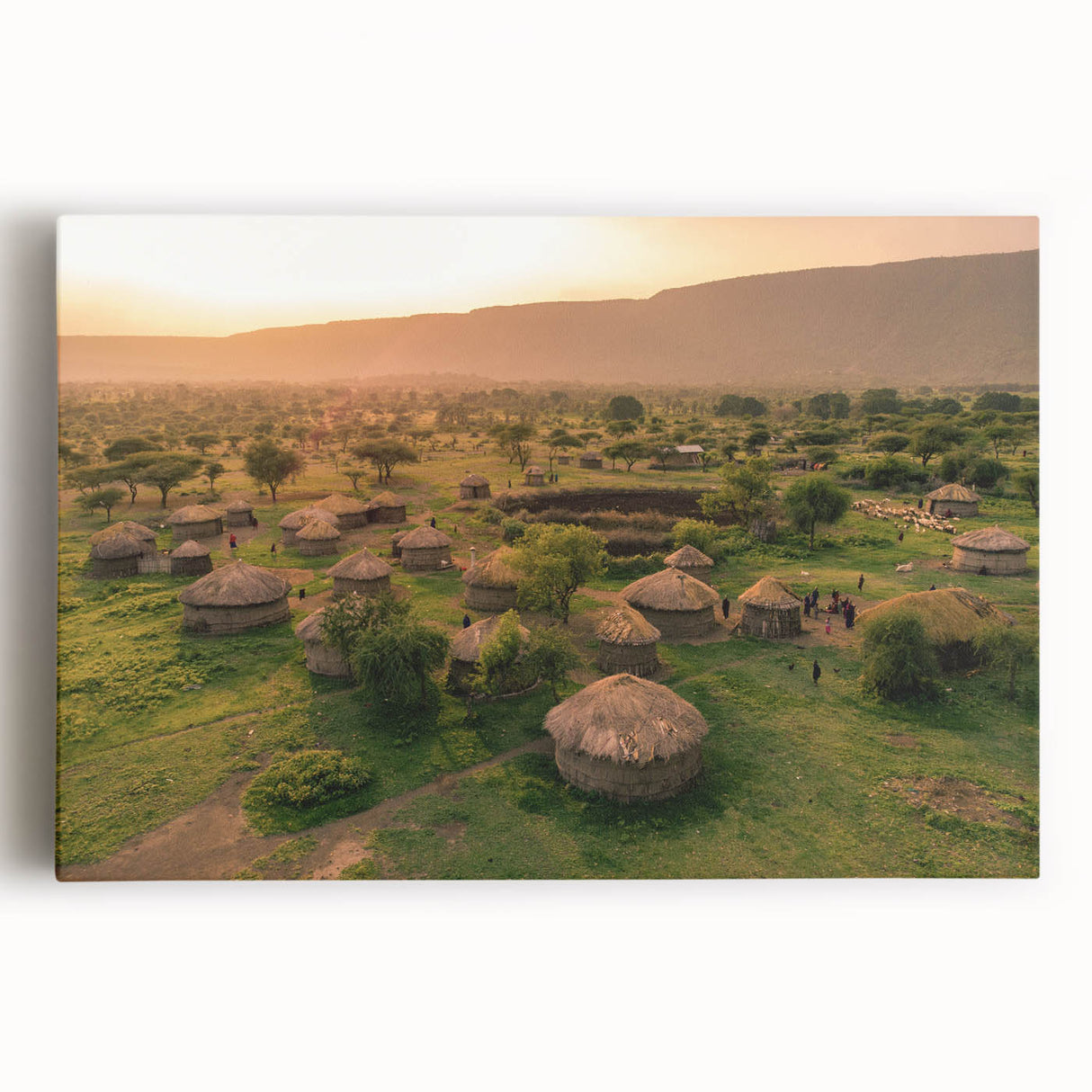 Stretched canvas wall art depicting a serene village landscape with vibrant colors and intricate details, perfect for home decor and enhancing interior spaces.