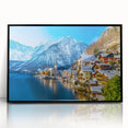 Framed acrylic wall art showcasing a serene village landscape with vibrant colors, designed to enhance home decor; features a sleek black frame for elegant presentation.