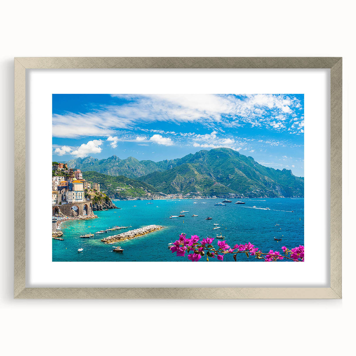 Framed wall art featuring a serene landscape village design, enclosed in a sleek silver frame with a white mat, ideal for home decor. Perfect for enhancing interior aesthetics.