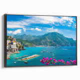 Framed canvas wall art depicting a picturesque village landscape with vibrant colors and intricate details, showcasing a black frame and side view for elegant decor.