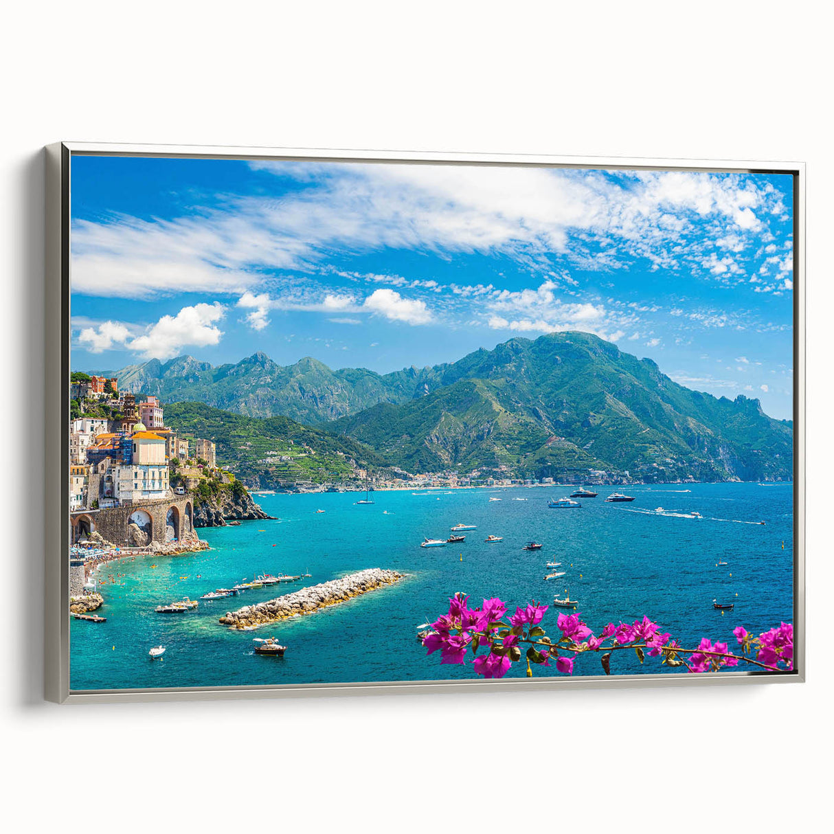 Framed canvas wall art showcasing a serene village landscape design with vibrant colors and intricate details, featuring a silver frame that adds elegance. Ideal for home decor, this artwork enhances any living space with its tranquil charm and artistic flair.